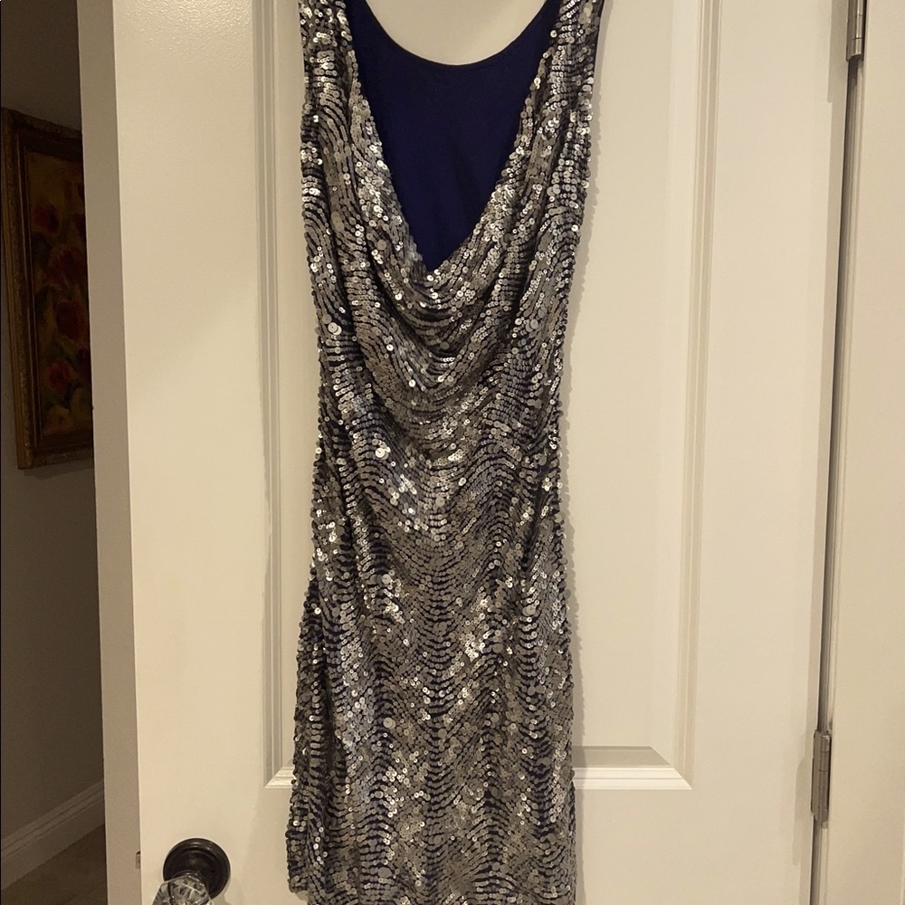 A beautiful sequence cocktail dress (w/lining) made in Italy/Milano; Size Small.